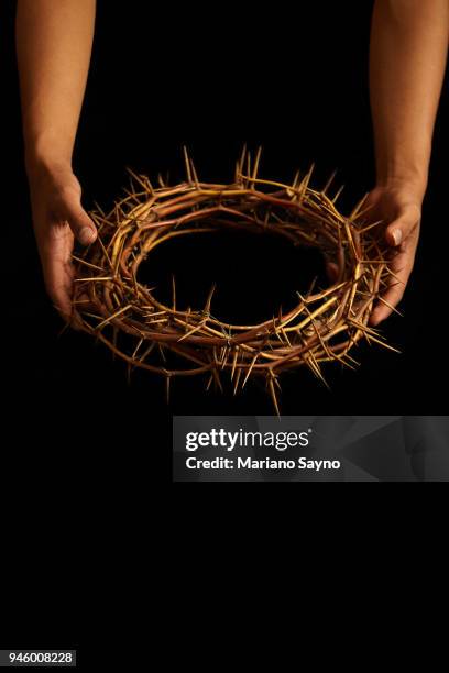 man holding a crown of thorns - asian man covering ears stock pictures, royalty-free photos & images