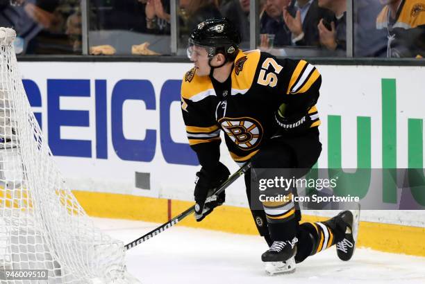 Boston Bruins winger Tommy Wingels tries to recover after being boarded during Game 1 of the First Round for the 2018 Stanley Cup Playoffs between...