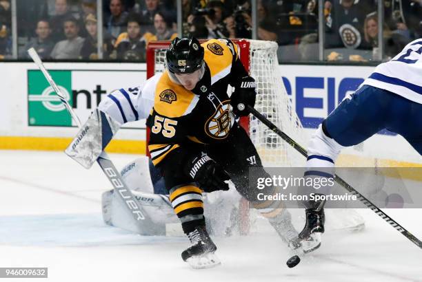 Boston Bruins right wing Noel Acciari broken up in front of Toronto Maple Leafs goalie Frederik Andersen during Game 1 of the First Round for the...