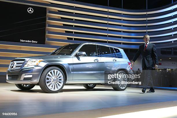 Thomas Weber, Daimler AG management board member, walks near a Mercedes-Benz Vision GLK during the 2008 North American International Auto Show in...