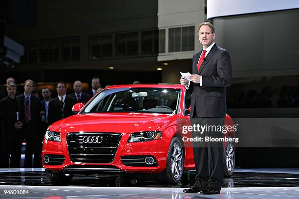 Johan de Nysschen, Audi of America executive vice president, speaks during the 2008 North American International Auto Show in front of an Audi A4...