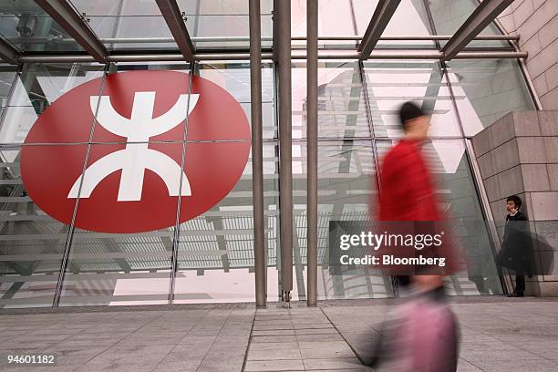Man walks past the MTR Corp. Logo at Hong Kong Station in Hong Kong, China, on Tuesday, March 13, 2007. MTR Corp., Hong Kong's subway operator, rose...