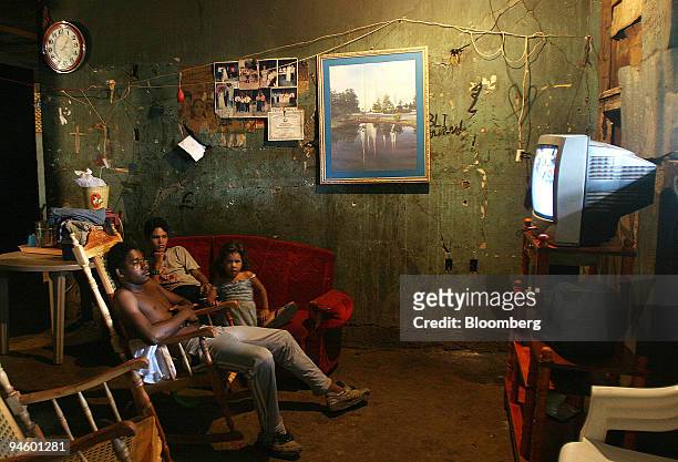 Poor family watches TV in a house of Colony Los Escombros, which was destroyed during the earthquake of 1972 in Managua, Nicaragua, Friday, November...
