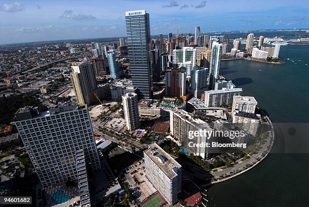 Construction cranes dot the skyline of Miami, Florida, Sunday, March 11, 2007. In the middle of the biggest glut of condominiums in more than 30...