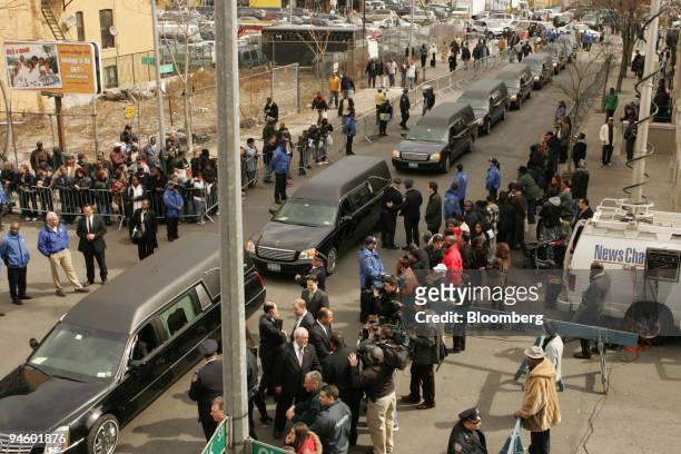 The funeral procession for the Magassa and Soumare families are lined up outside of a Bronx funeral home in the Bronx borough of New York, on Monday,...