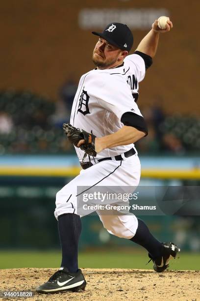 Alex Wilson of the Detroit Tigers throws a eighth inning pitch while playing the New York Yankees at Comerica Park on April 13, 2018 in Detroit,...