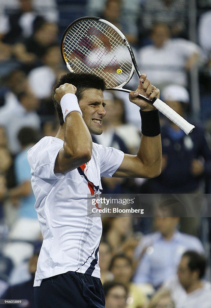 Novak Djokovic of Serbia reacts following his victory over C