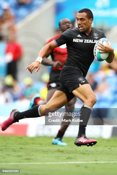 Sione Molia of New Zealand breaks away to score a try during the Rugby Sevens match between New Zealand and Kenya on day 10 of the Gold Coast 2018...