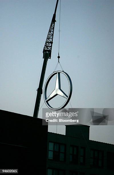 Mercedes-Benz logo hangs outside of the Museum of Contemporary Art in Detroit, Michigan, U.S., on Saturday, Jan. 12, 2008. The Mercedes-Benz Vision...