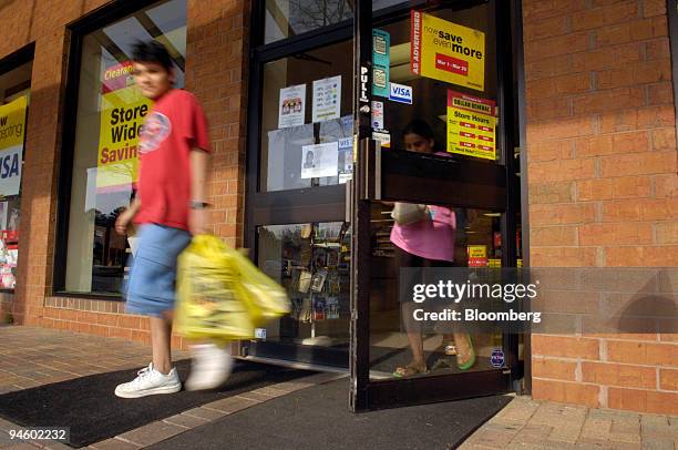 Mauro Delgado exits a Dollar General store in Sandy Springs, GA on Monday March 12, 2007 . Dollar General Corp., the U.S. Retailer with the most...