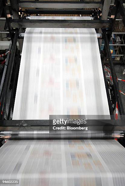 Rotary press prints Les Echos newspapers at Le Monde printing works in Ivry sur Seine near Paris, France, Thursday, June 28, 2007. Bernard Arnault,...