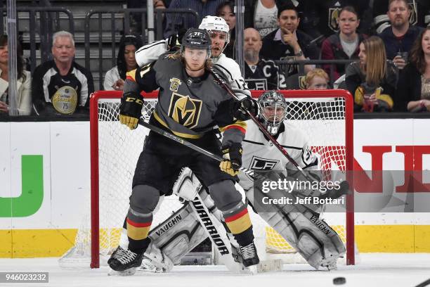 Alec Martinez and Jonathan Quick of the Los Angeles Kings defend their goal against William Karlsson of the Vegas Golden Knights in Game Two of the...