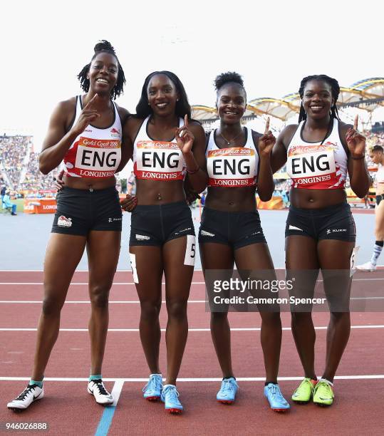 Lorraine Ugen, Bianca Williams, Dina Asher-Smith and Asha Philip of England of England celebrate as they win gold in the Women's 4x100 metres relay...