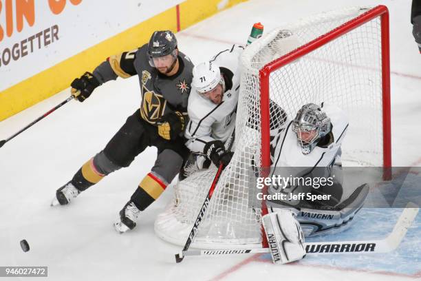 Torrey Mitchell and Jonathan Quick of the Los Angeles Kings defend against Tomas Tatar of the Vegas Golden Knights in Game Two of the Western...
