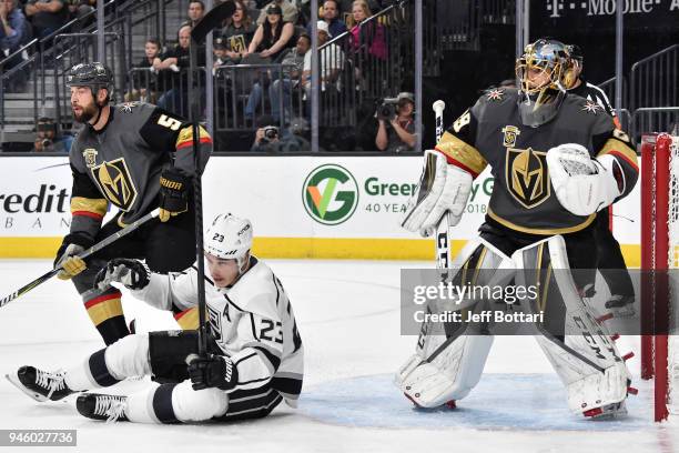 Marc-Andre Fleury and Deryk Engelland of the Vegas Golden Knights defend their goal against Dustin Brown of the Los Angeles Kings in Game Two of the...