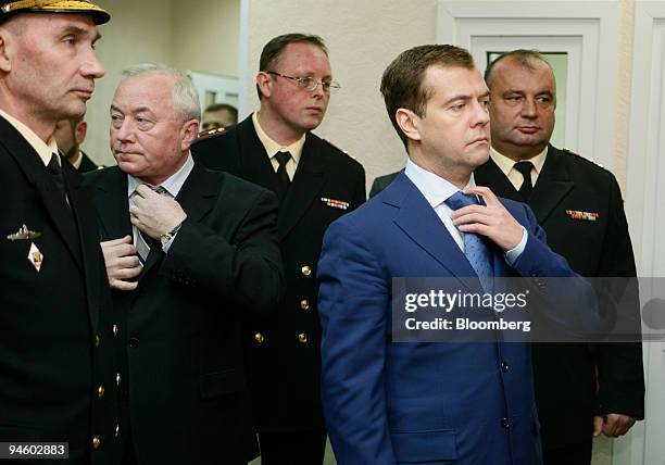 Dmitry Medvedev, first deputy prime minister of Russia, right, visits the main Russian northern navy fleet hospital in Severomorsk, Russia, on...