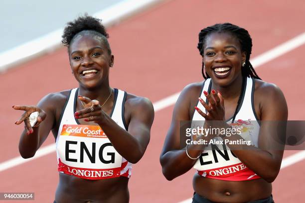 Dina Asher-Smith and Asha Philip of England celebrate as they win gold in the Women's 4x100 metres relay final during athletics on day 10 of the Gold...