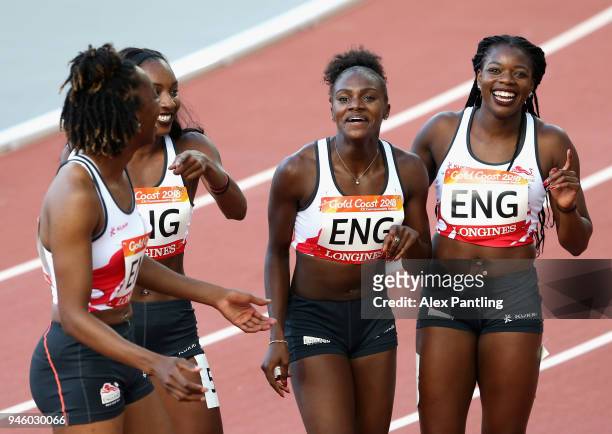 Lorraine Ugen, Bianca Williams, Dina Asher-Smith and Asha Philip of England of England celebrate as they win gold in the Women's 4x100 metres relay...