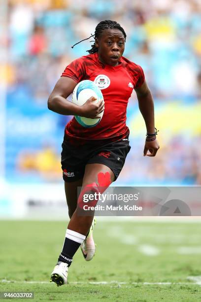 Sheilla Chajira of Kenya makes a break during the womens Rugby Sevens match between South Africa and Kenya on day 10 of the Gold Coast 2018...