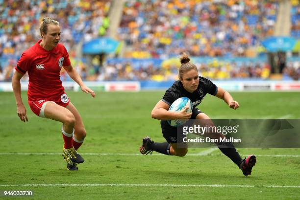 Michaela Blyde of New Zealand dives over for a try during Rugby Sevens Women's Pool A match between New Zealand and Canada on day 10 of the Gold...