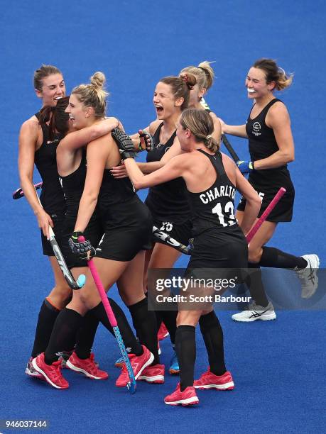 Olivia Merry of New Zealand is congratulated by her teammates after scoring her teams third goal during the Women's Gold Medal match between...