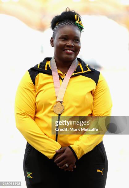 Gold medalist Danniel Thomas-Dodd of Jamaica celebrates during the medal ceremony for the Womens Shot Put during athletics on day 10 of the Gold...