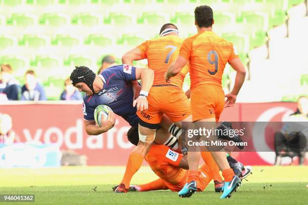 Ross Haylett-Petty of the Rebals is tackled during the round nine Super Rugby match between the Rebels and the Jaguares at AAMI Park on April 14,...
