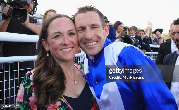 Hugh Bowman hugs wife Christine after winning race 7 The Queen Elizabeth Stakes during day two of The Championships as part of Sydney Racing at Royal...