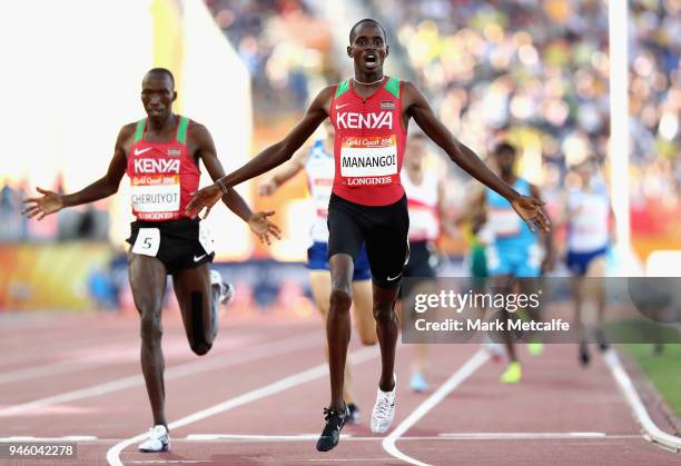 Elijah Motonei Manangoi of Kenya celebrates as he crosses the line to win gold ahead of Timothy Cheruiyot of Kenya in the Men's 1500 metres final...