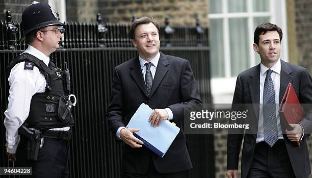 Ed Balls, Secretary of State for Children, Schools and Families, center, and Andy Burnham, Chief Secretary to the Treasury arrive at 10 Downing...