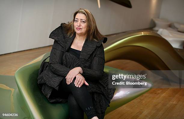 Architect Zaha Hadid poses at the opening of her first exhibition in the U.K., at the Design Museum in Shad Thames, in London's Docklands, Thursday,...