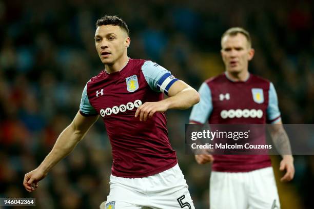 James Chester and Glenn Whelan of Aston Villa during the Sky Bet Championship match between Aston Villa and Leeds United at Villa Park on April 13,...