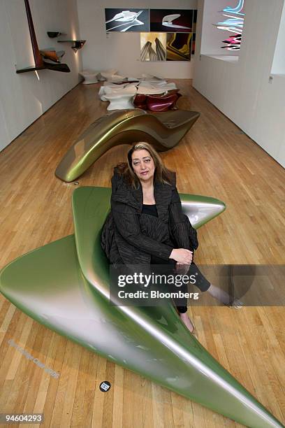 Architect Zaha Hadid poses at the opening of her first exhibition in the U.K., at the Design Museum in Shad Thames, in London's Docklands, Thursday,...