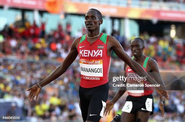 Elijah Motonei Manangoi of Kenya celebrates as he crosses the line to win gold ahead of Timothy Cheruiyot of Kenya in the Men's 1500 metres final...