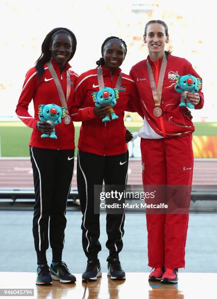 Silver medalist Margaret Chelimo Kipkemboi of Kenya, gold medalist Hellen Obiri of Kenya and bronze medalist Laura Weightman of England pose during...
