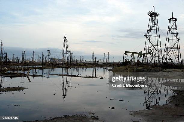 Towers dot the skyline at an old oil field near Baku, Azerbaijan, on Thursday, October 26, 2006.