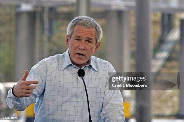 President George W. Bush and Brazilian President Luiz Inacio Lula da Silva make a joint statement after a visit to a Petrobras Transporte S.A....