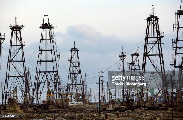 Towers dot the skyline at an old oil field near Baku, Azerbaijan, on Thursday, October 26, 2006. It is boom time in Baku, the capital of Azerbaijan:...