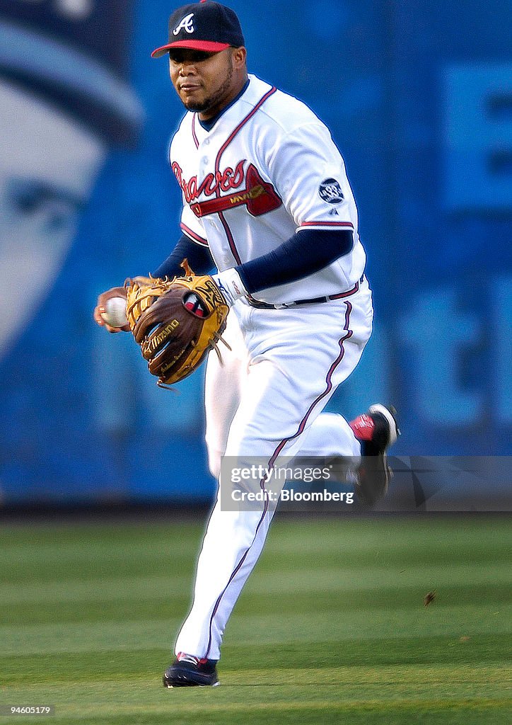 Andruw Jones, center fielder for the Atlanta Braves, makes a play... News Photo - Getty Images