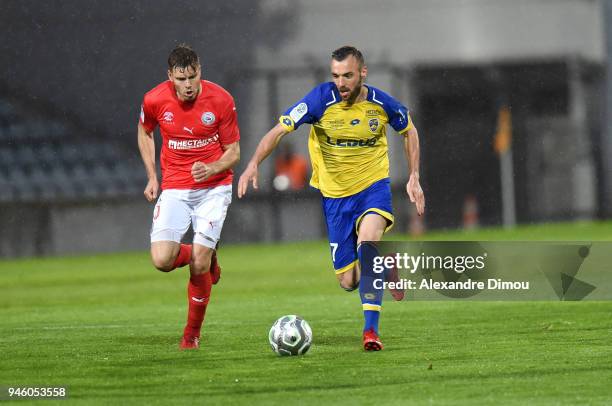 Florin Berenguer Bohrer of Sochaux and Renaud Ripart of Nimes during the French Ligue 2 match between Nimes and Sochaux at Stade des Costieres on...