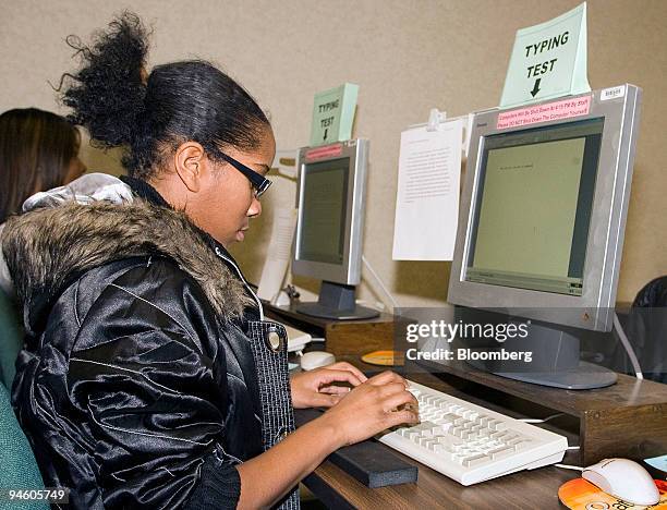 Brittani Mack takes a typing placement test prior to posting her resume with with the state of California's Employment Development Department at the...