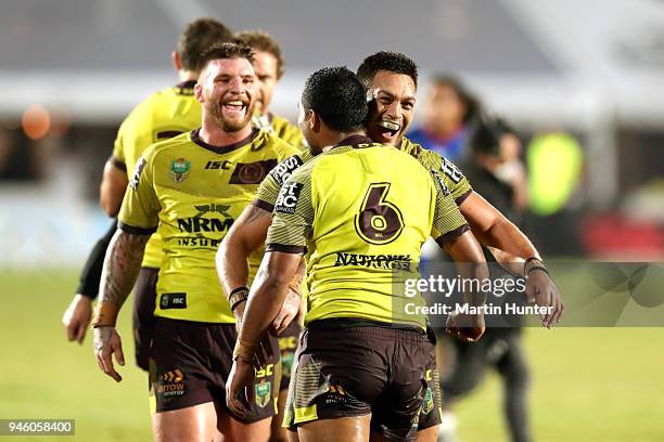 Broncos team mates celebrate after the round six NRL match between the New Zealand Warriors and the Brisbane Broncos at Mt Smart Stadium on April 14,...