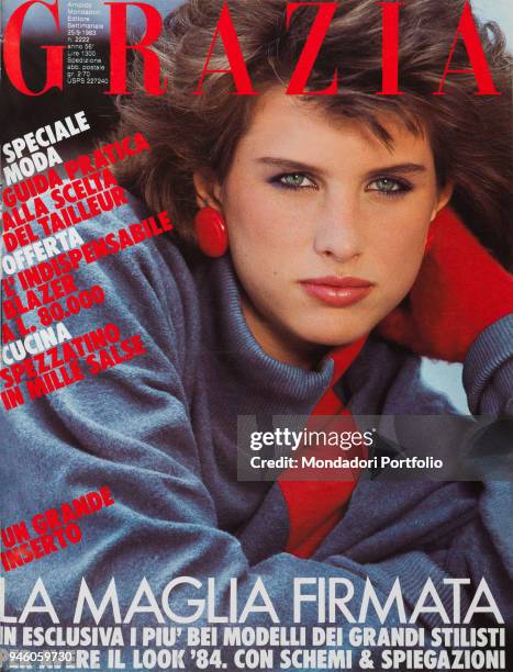 Cover of the women magazine Grazia. Model wearing an Elisabeth de Senneville sweater: brushed cotton red and grey dress with rib-stitch neck and...