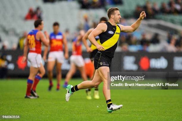 Kane Lambert of the Tigers celebrates kicking a goal during the round four AFL match between the Richmond Tigers and the Brisbane Lions at Melbourne...