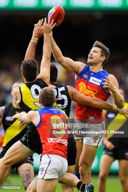 Stefan Martin of the Lions contests the ball during the round four AFL match between the Richmond Tigers and the Brisbane Lions at Melbourne Cricket...