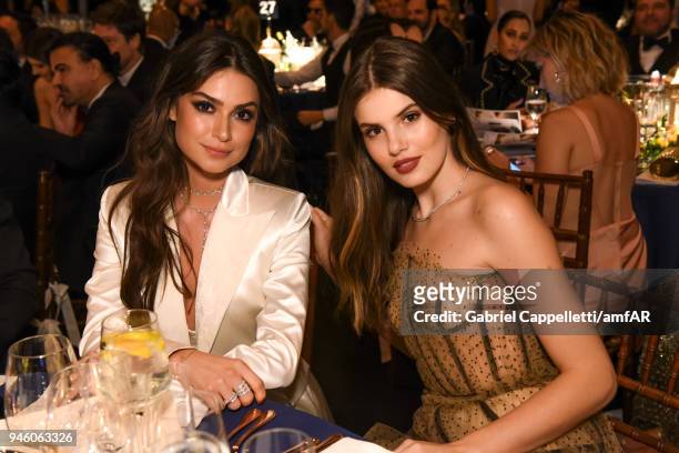 Thaila Ayala And Camila Queiroz attends the 2018 amfAR gala Sao Paulo at the home of Dinho Diniz on April 13, 2018 in Sao Paulo, Brazil.