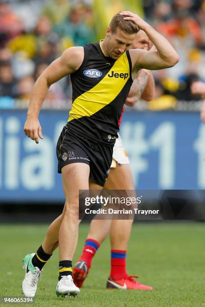 Kane Lambert of the Tigers reacts after missing a goal during the round four AFL match between the Richmond Tigers and the Brisbane Lions at...