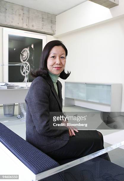 Atsuko Koyanagi, owner of Gallery Koyanagi, poses for a photograph in front of a work by Hiroshi Sugimoto in her office in Tokyo, Japan, March 8,...
