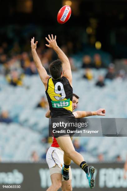 Trent Cotchin of the Tigers attempts to mark the ball during the round four AFL match between the Richmond Tigers and the Brisbane Lions at Melbourne...