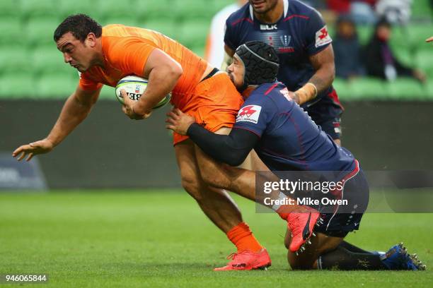 Agustin Creevy of the Jaguares is tackled by Tetera Faulkner of the Rebals during the round nine Super Rugby match between the Rebels and the...